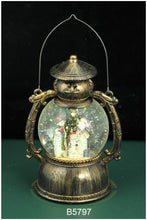 Load image into Gallery viewer, Antique Black Snowman Oil Lamp LED Snow Globe